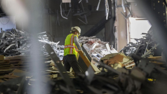 Man removing demolition debris | HelpForce, LLC